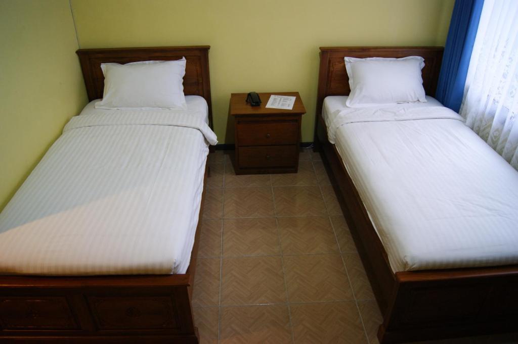 סוראבאיה Grand Sumatera Hotel חדר תמונה