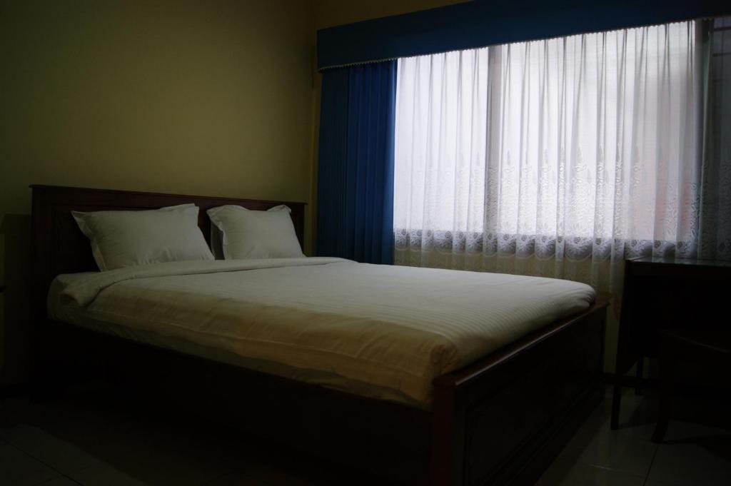 סוראבאיה Grand Sumatera Hotel חדר תמונה