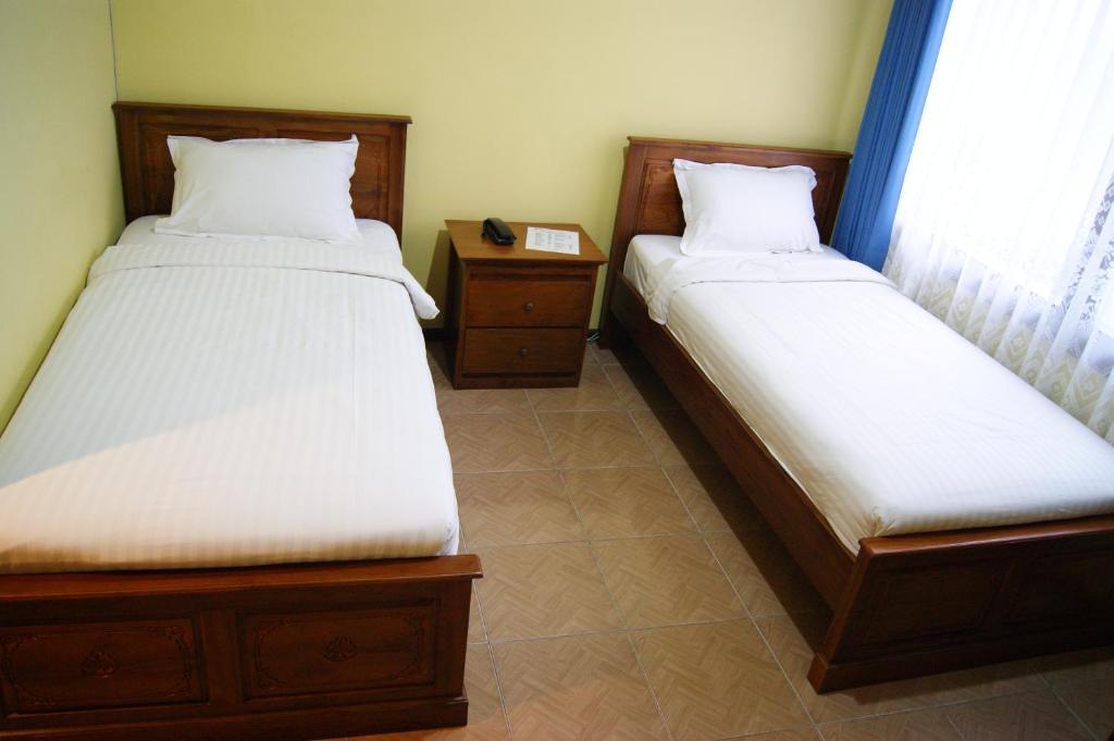 סוראבאיה Grand Sumatera Hotel חדר תמונה