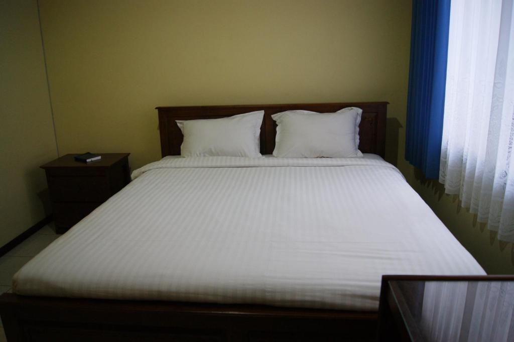 סוראבאיה Grand Sumatera Hotel חדר תמונה